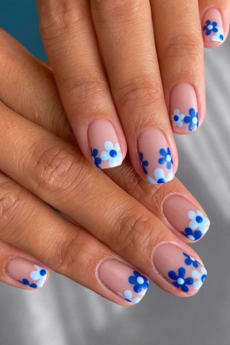 Short nails with blue floral French tips