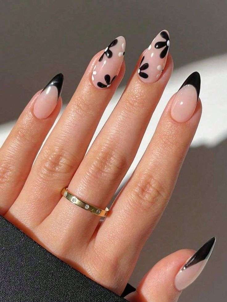 Stiletto nails with black and white floral art