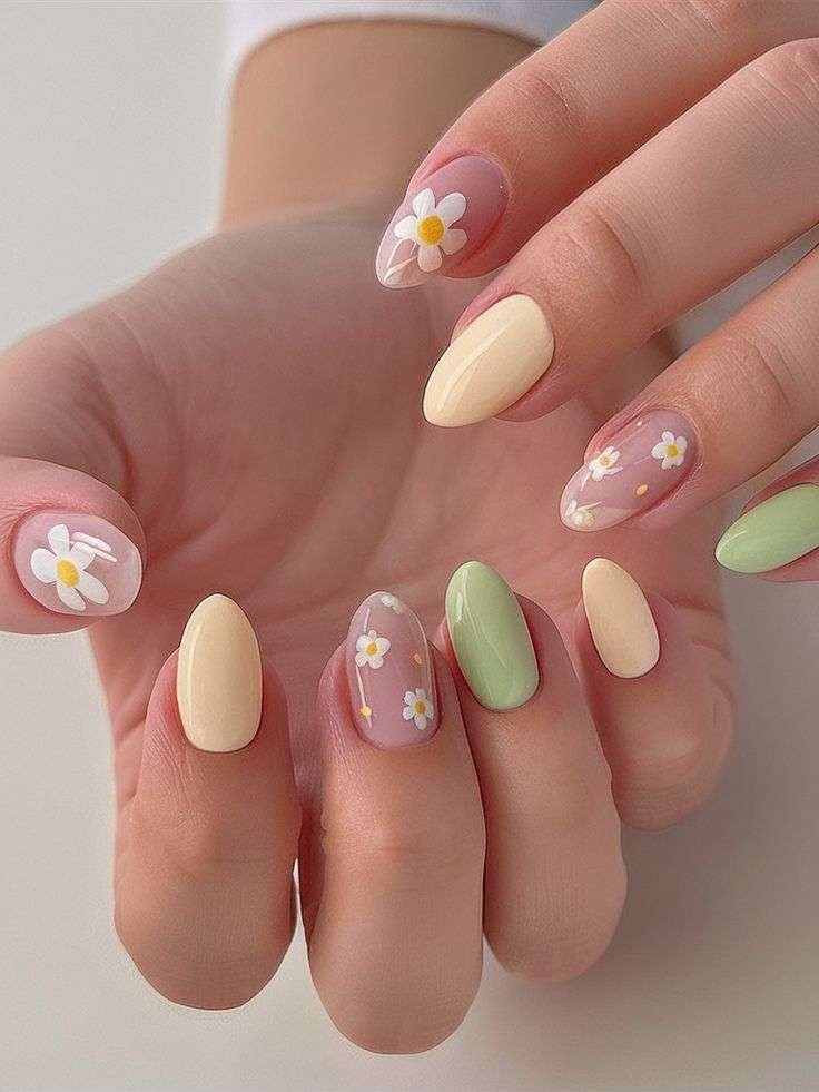 Almond nails with daisy floral art