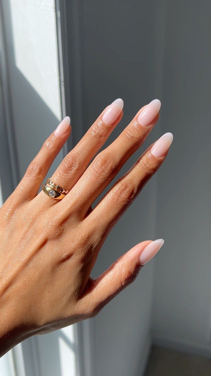 Almond nails with sheer pink polish
