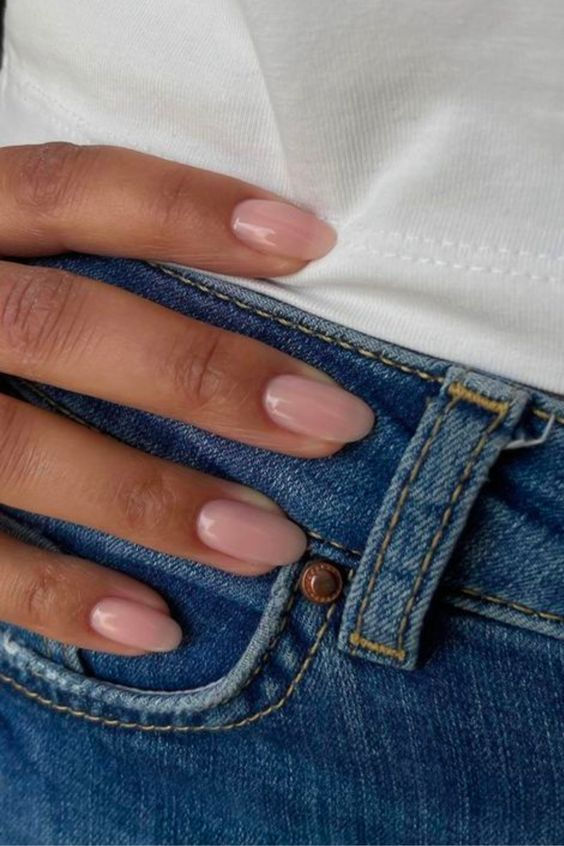 Medium almond nails with nude polish