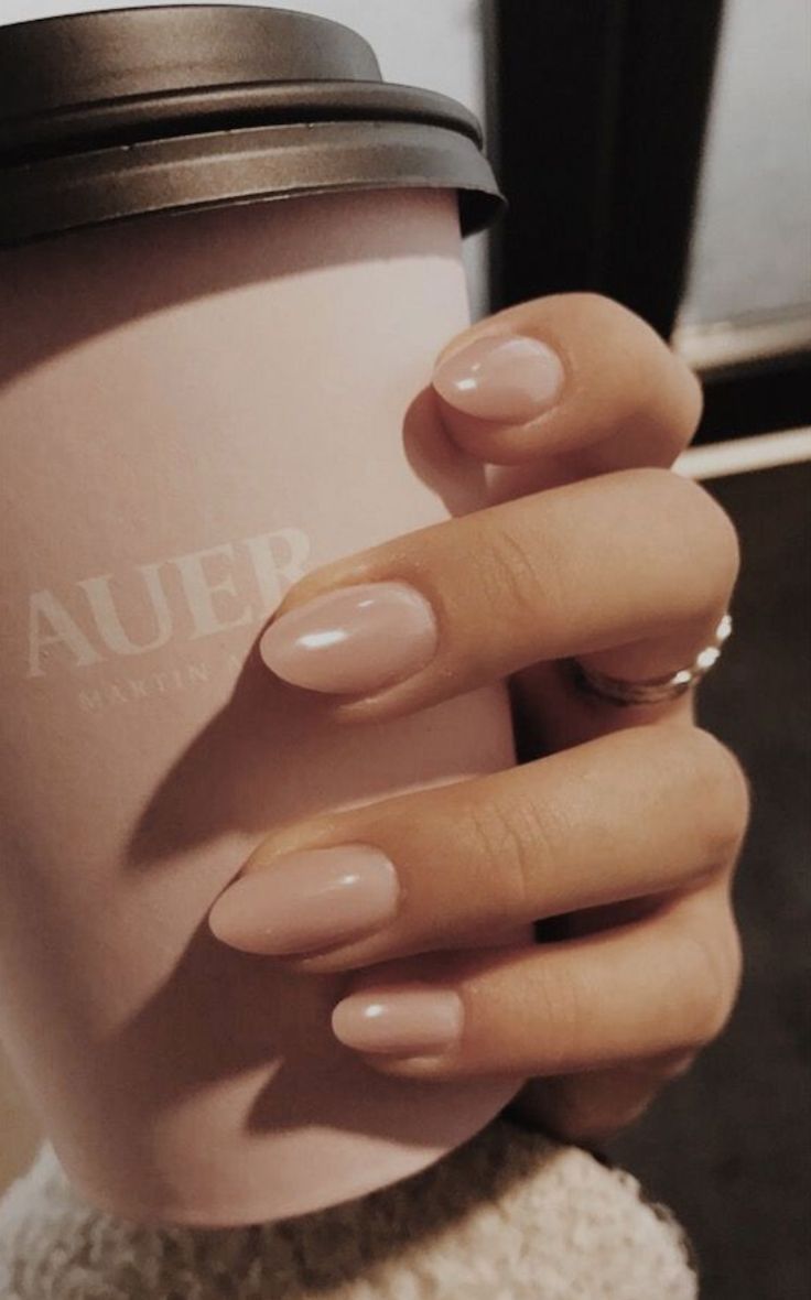 Almond nails with glossy nude polish