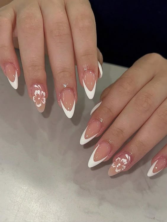 Almond white French tips with floral art.