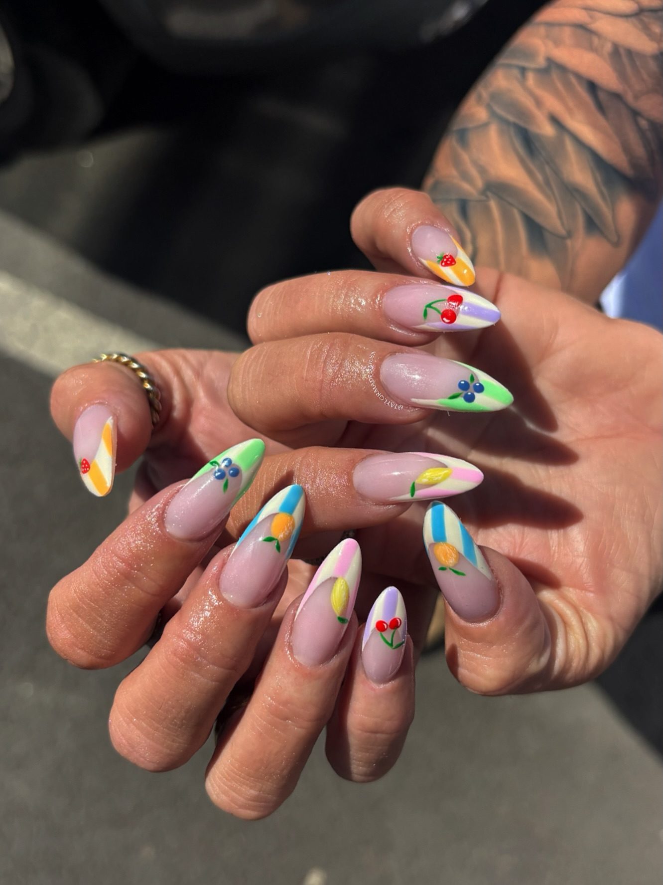 Almond fruit-inspired French tip nails.