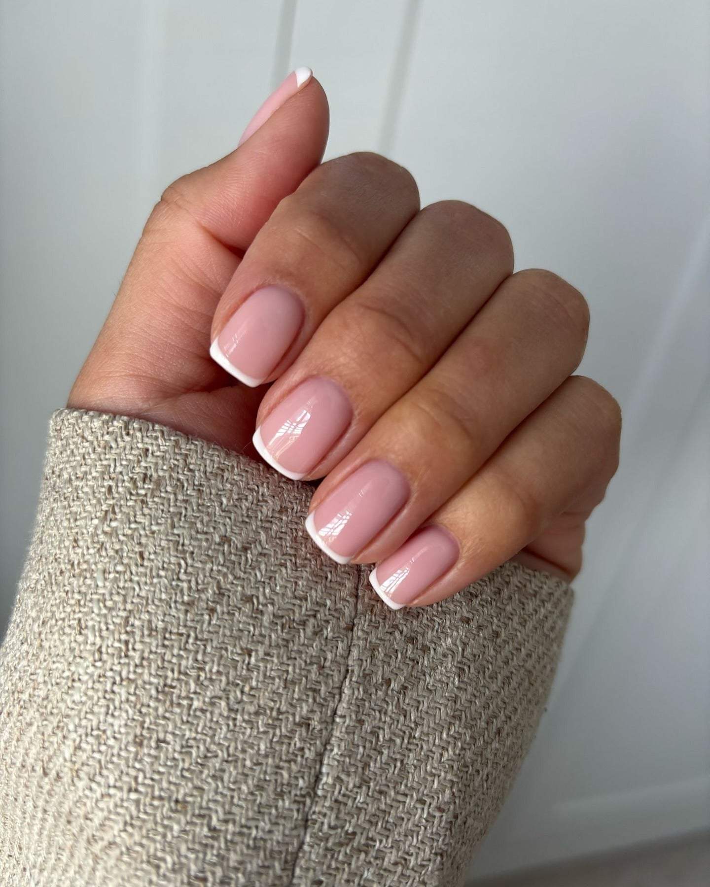Short classic square French tip nails.