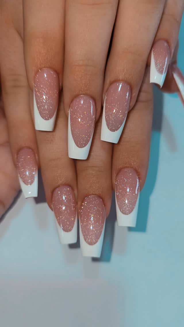 Square glitter white French tip nails.