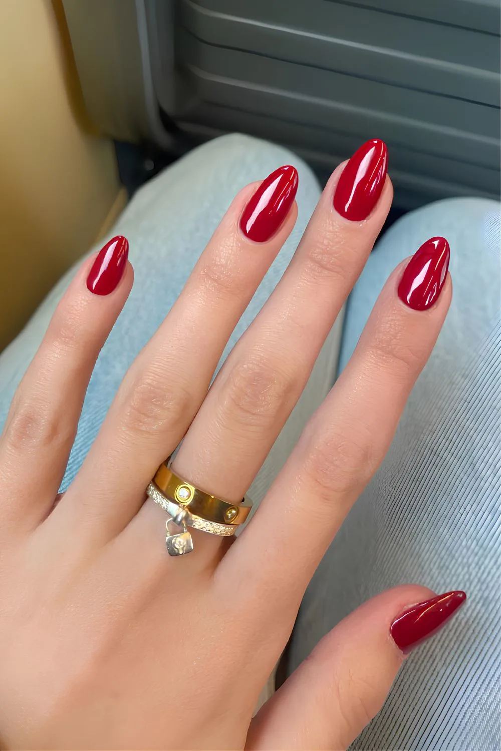 Cherry red almond nails, timeless and chic.