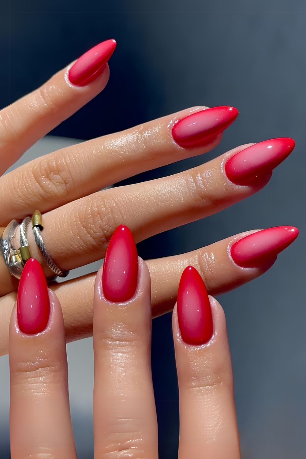 Sophisticated ombre red nails, chic and elegant.