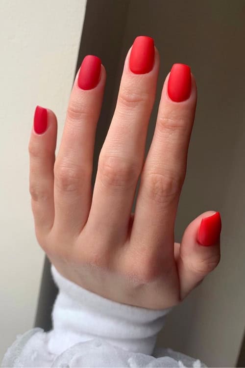 Matte red square nails, chic and understated.