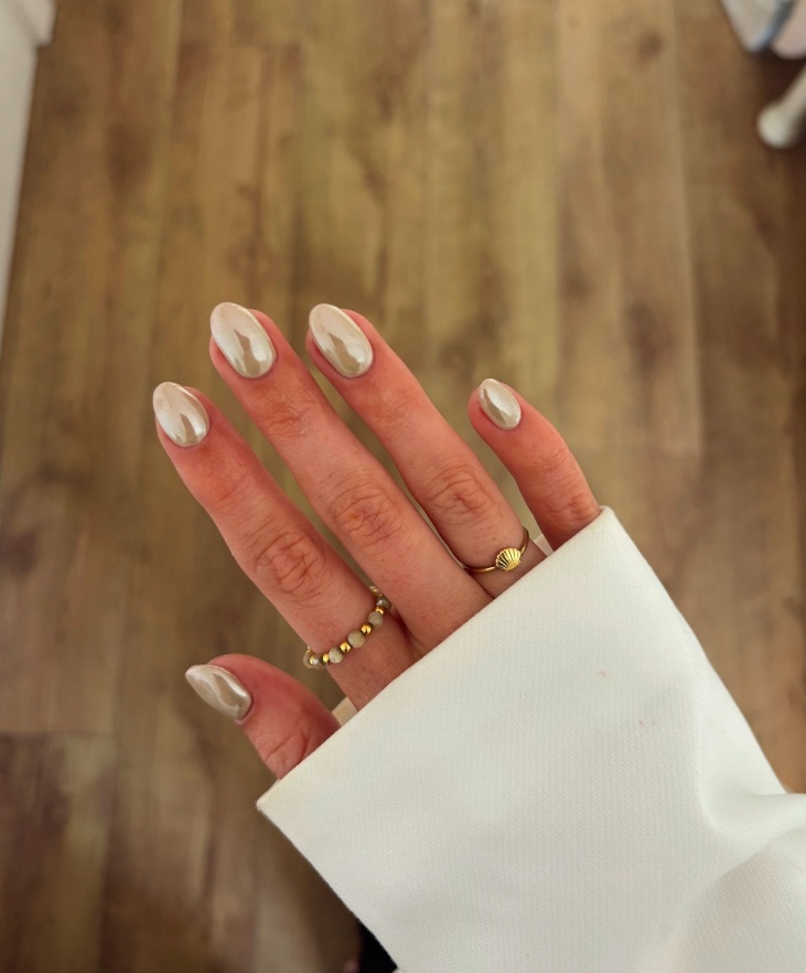 Chrome nails with abstract design in neutral tones