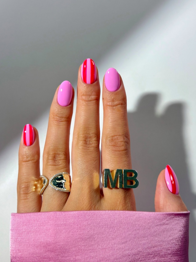 Medium pink nails with red stripes
