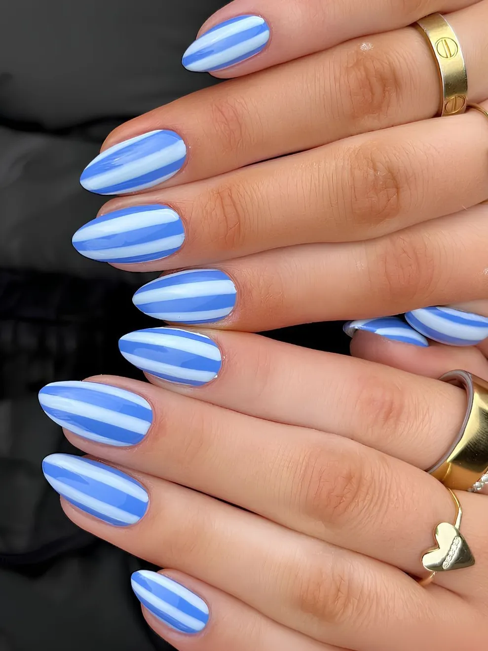 Medium blue nails with white stripes