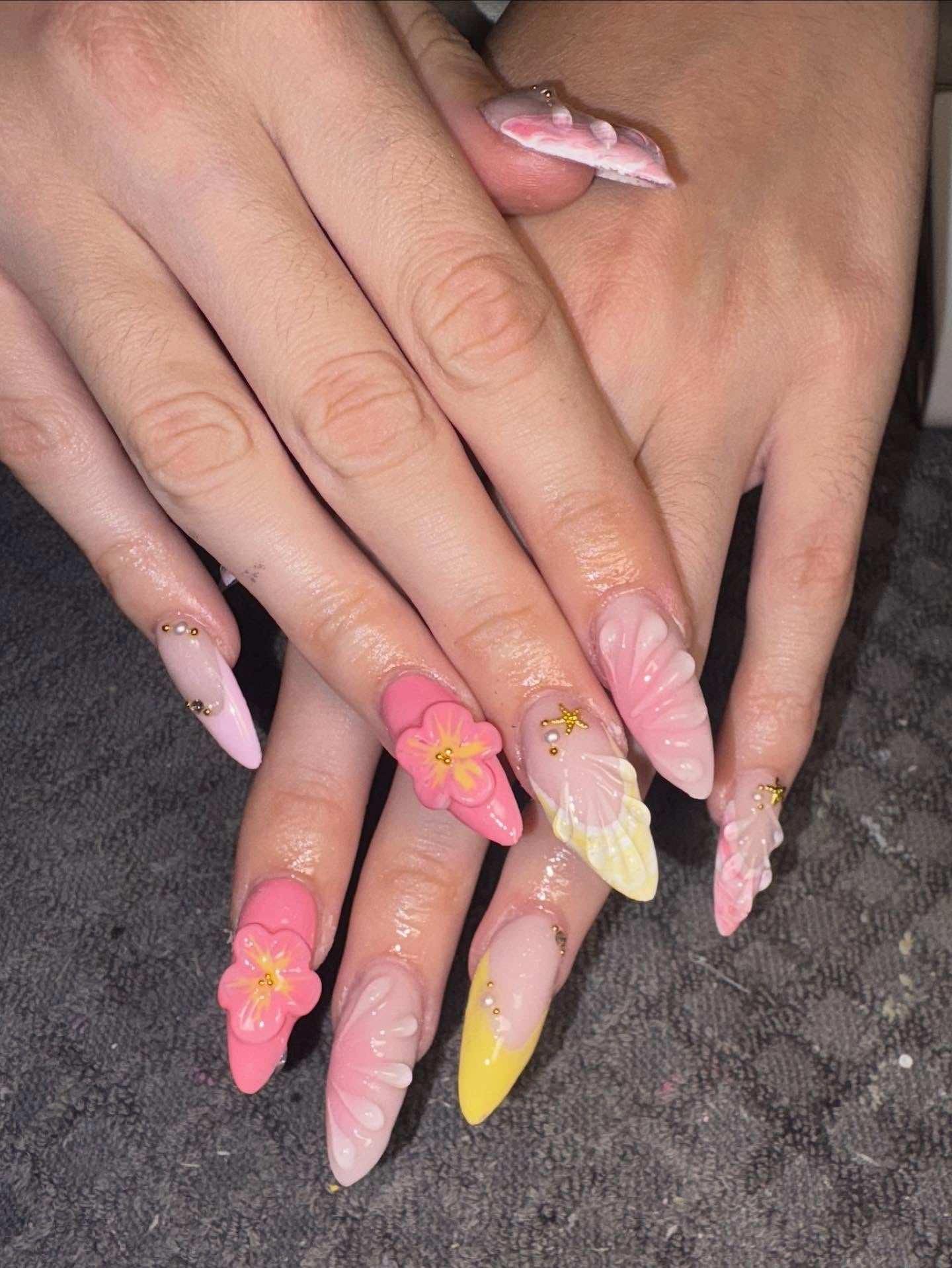 Long stiletto nails with 3D floral art