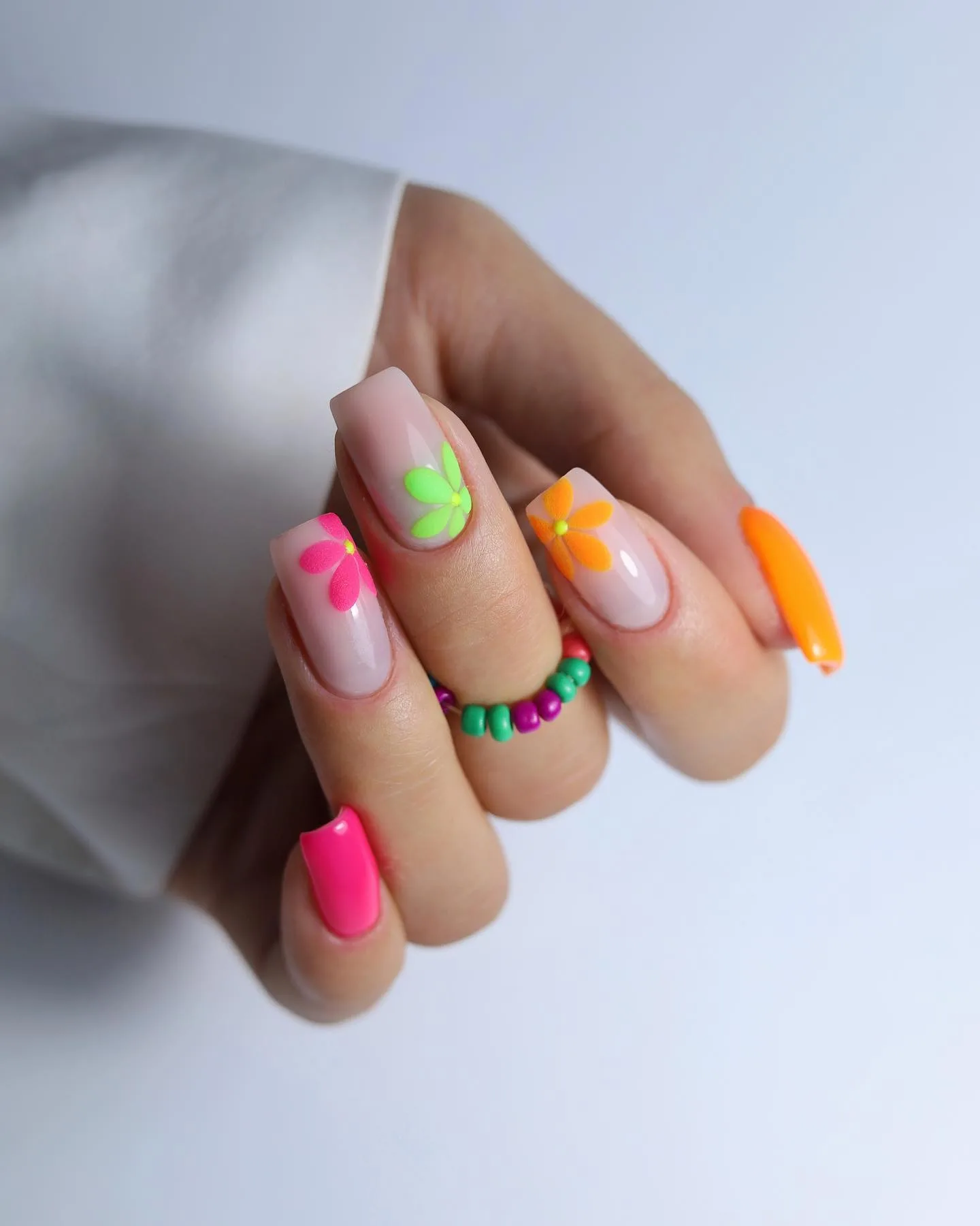 Neon floral nails with square shape