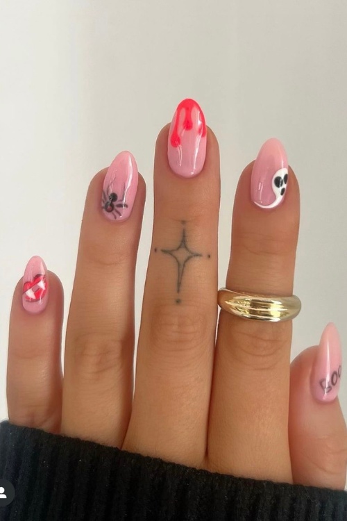 Nails halloween october showcasing nails for halloween, pink october nails, pink accents, designs for the season.