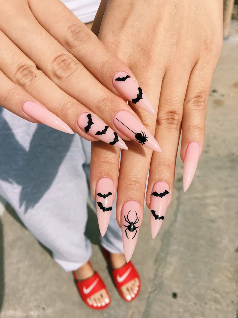 Minimalist halloween nails with halloween nails scream, purple spooky nails, movie, simple theme.