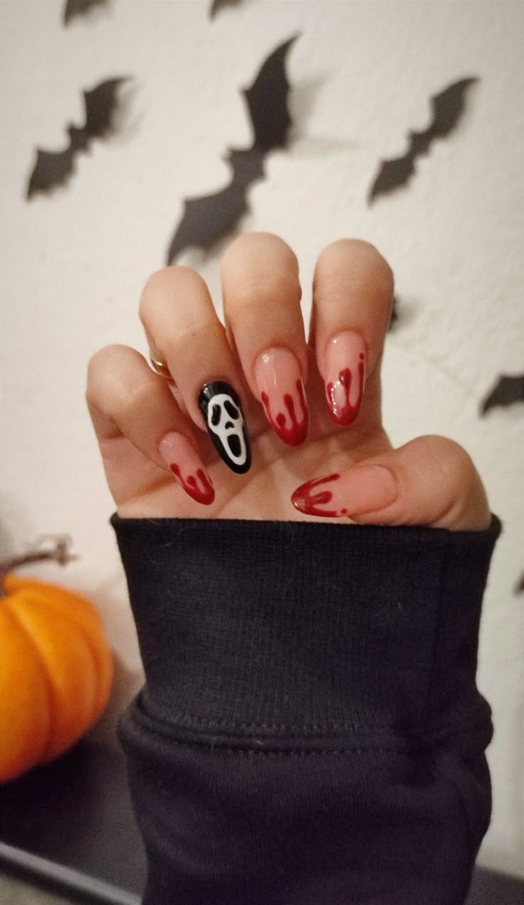 Simple halloween nails short with brown halloween nails, halloween french tips, red acrylic, stiletto shape.