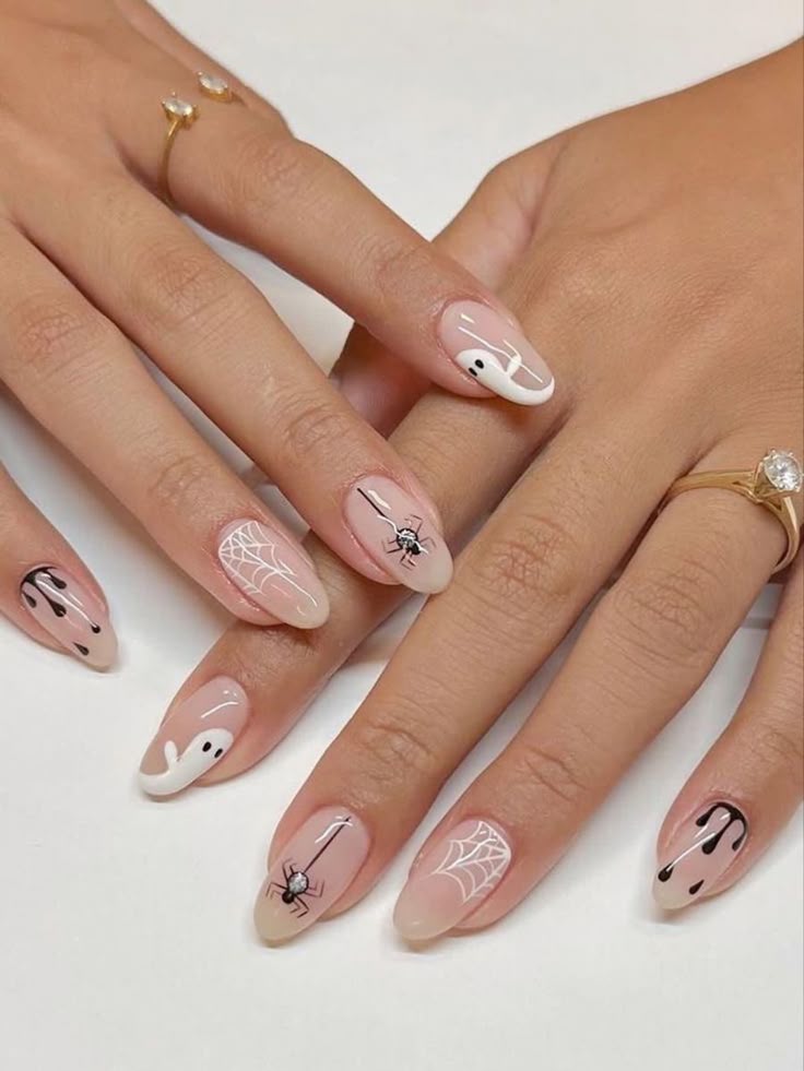 Gothic halloween nails with simple halloween nail designs, movie inspired nails, cool, cute simple style.