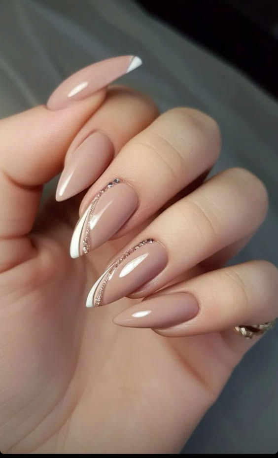 almond shape nails with russian almond nails featuring oval french tip nails and short almond nail art in baby pink.