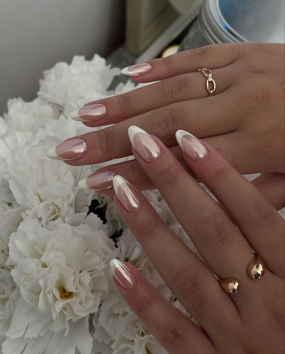trending almond nails with long almond french tip nails in baby pink nails for christmas using gel x.
