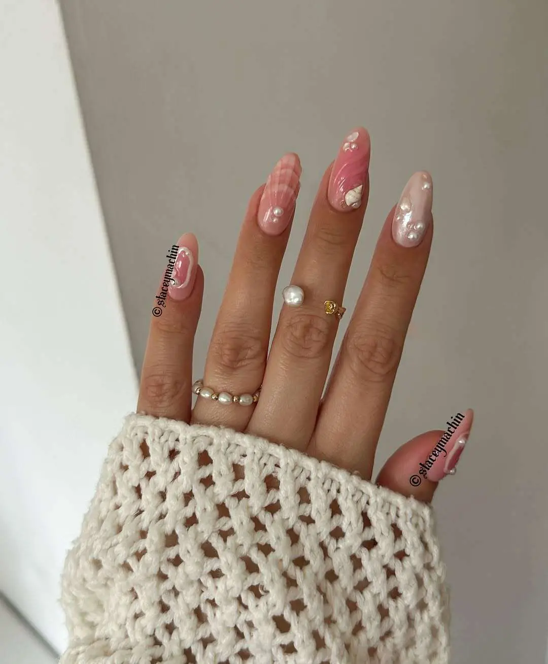 Pink plaid nails with pearl accents