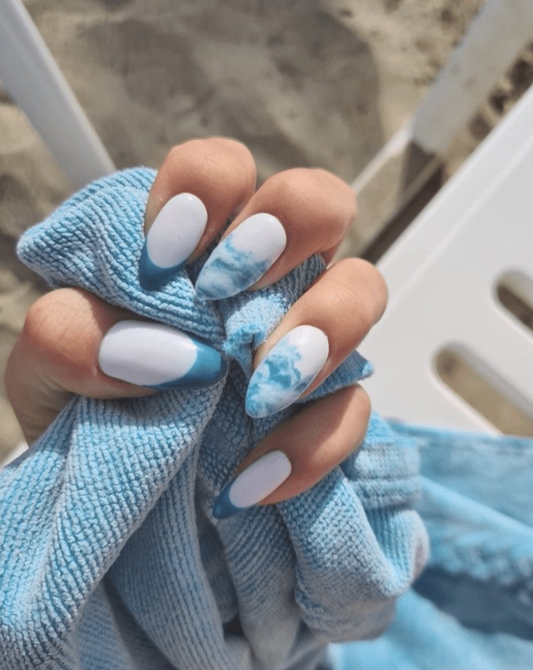 Blue and white ocean-inspired nail art