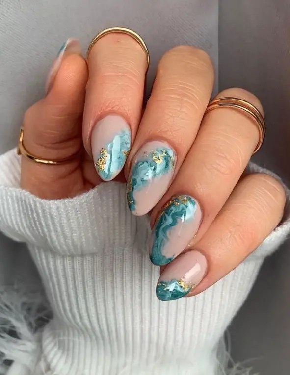 Teal marble nails with gold accents