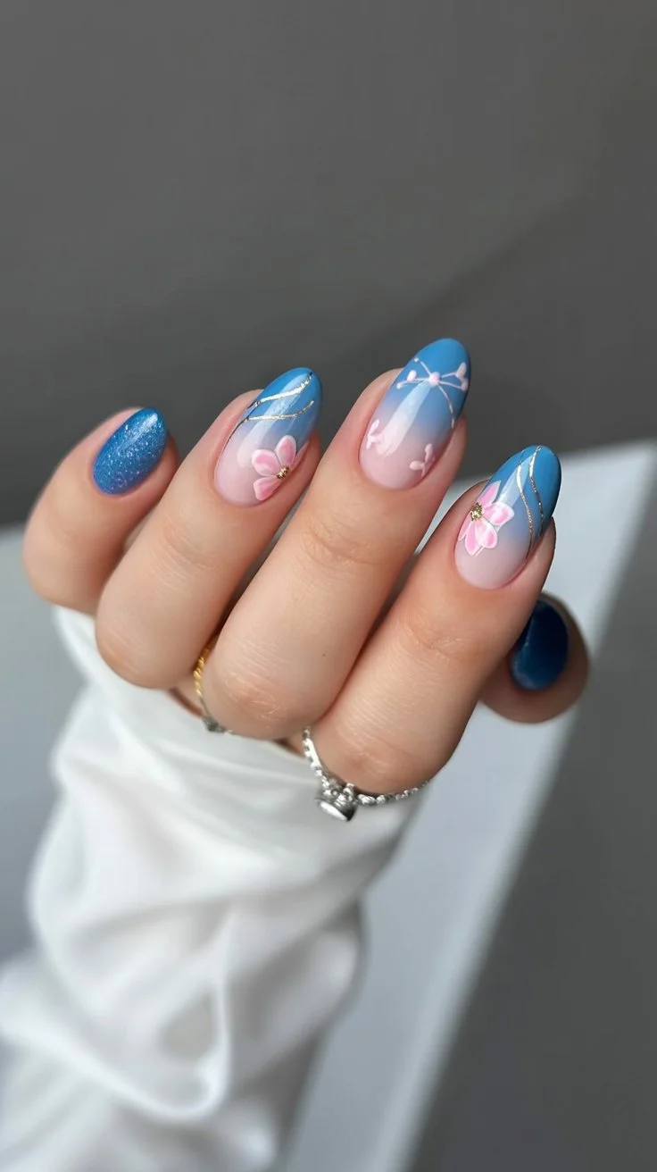 Blue floral nails with almond shape