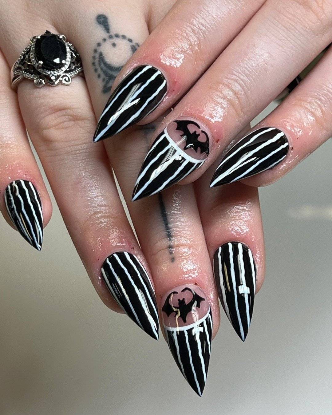 Striking black chrome nails designs, orange and black nails, dark pink nails, red and, pink.