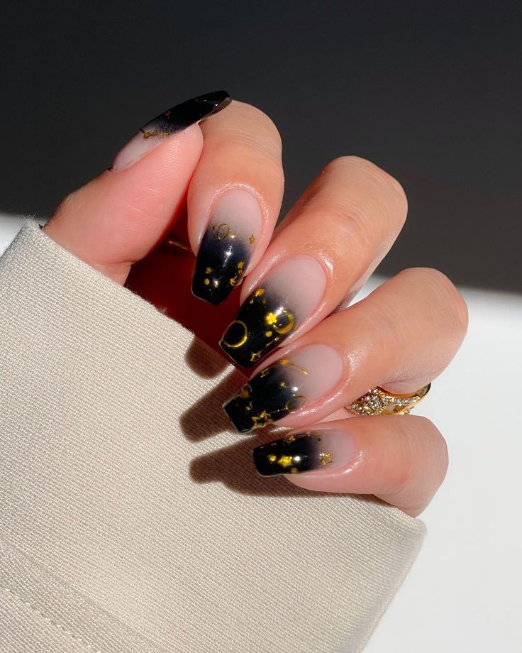 Enchanting black cat eye nails design, black star nails, black and sparkle nails, and purple, and yellow.