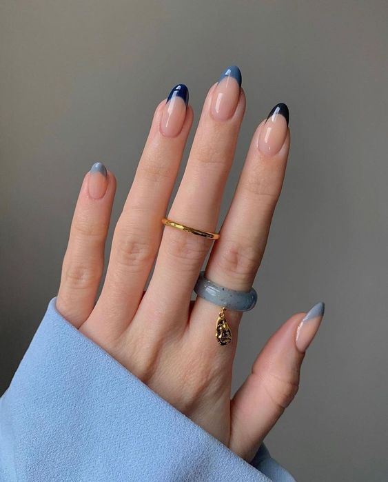 Light blue nails with cobalt blue nails, dark navy nails, red christmas nail designs, black and neon accents