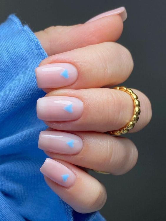 Dark blue nails with electric blue nails, navy nails with design, blue holiday nail designs, star embellishments, navy almond shape