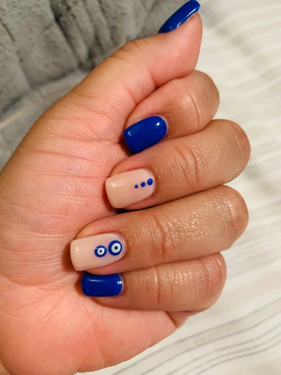 Blue chrome nails with navy blue chrome nails, simple blue nails, winter themed nails, beach gold hues