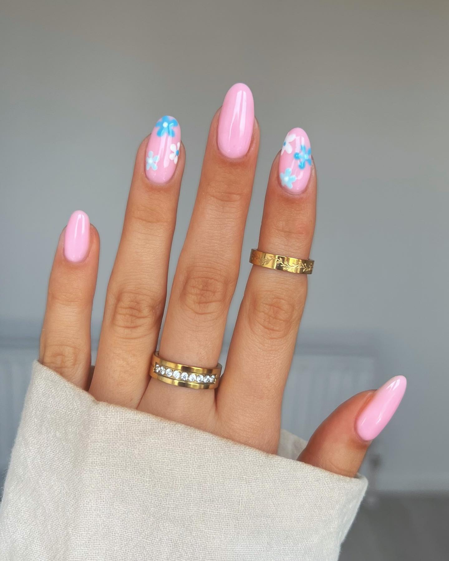 Light blue french tip nails with deep blue nails, bright summer nails, french and brown design