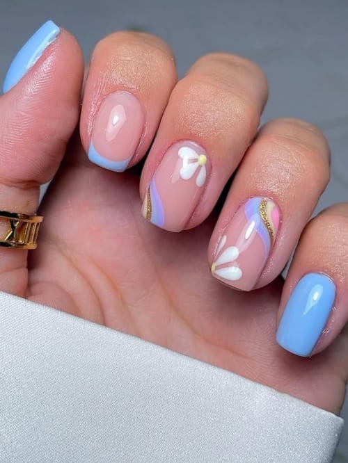 Blue star nails with pale blue nails, baby blue nails ideas, almond cateye design