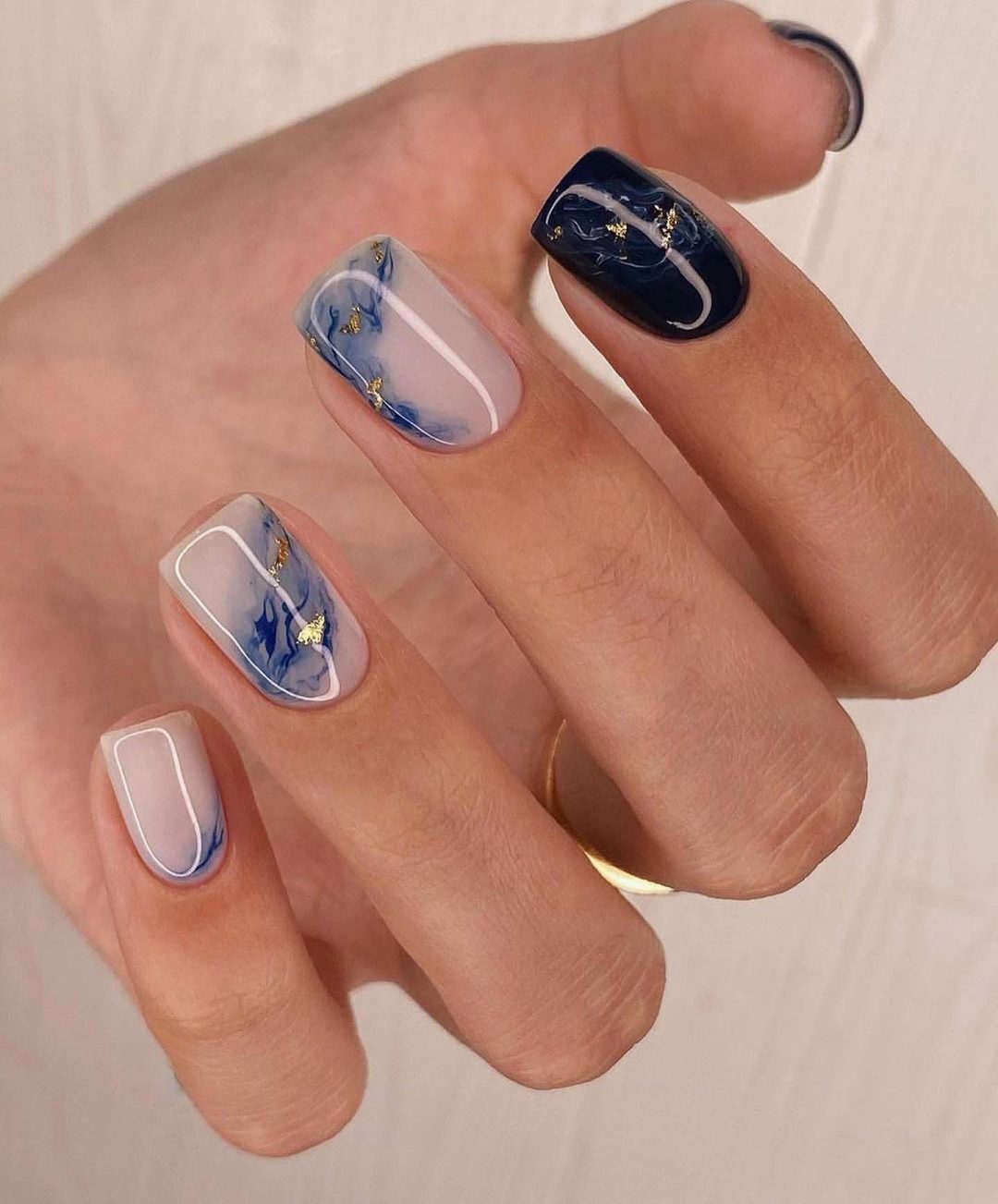 Blue spring nails with blue nail art, yellow nails ideas, light french tip, tip design