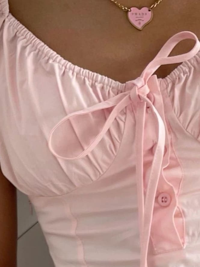 pink coquette outfit with hyperfeminine touches