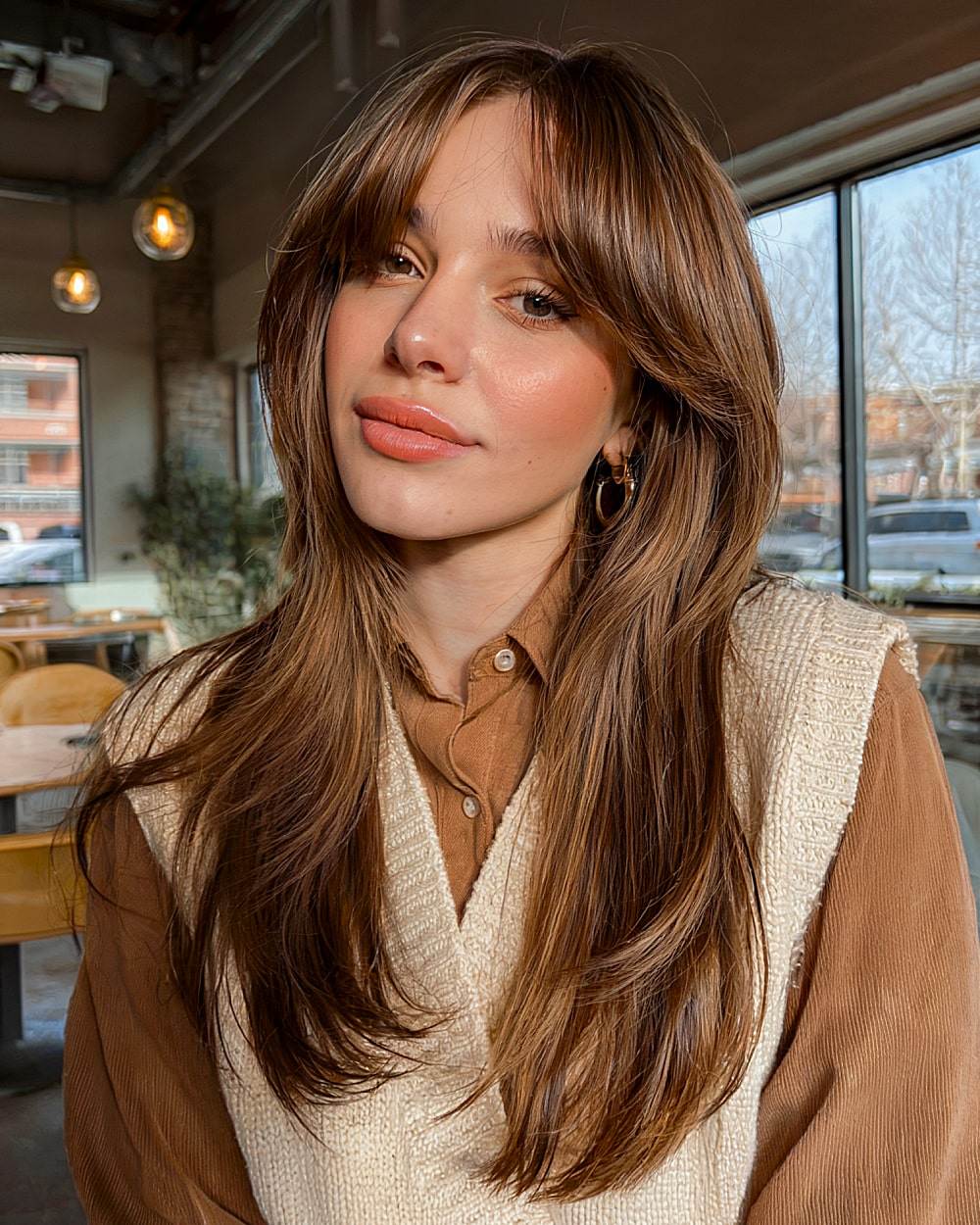 lob with curtain bangs, wavy curtain bangs, subtle bangs, curtain bangs with curls, short long hair, medium hair layers