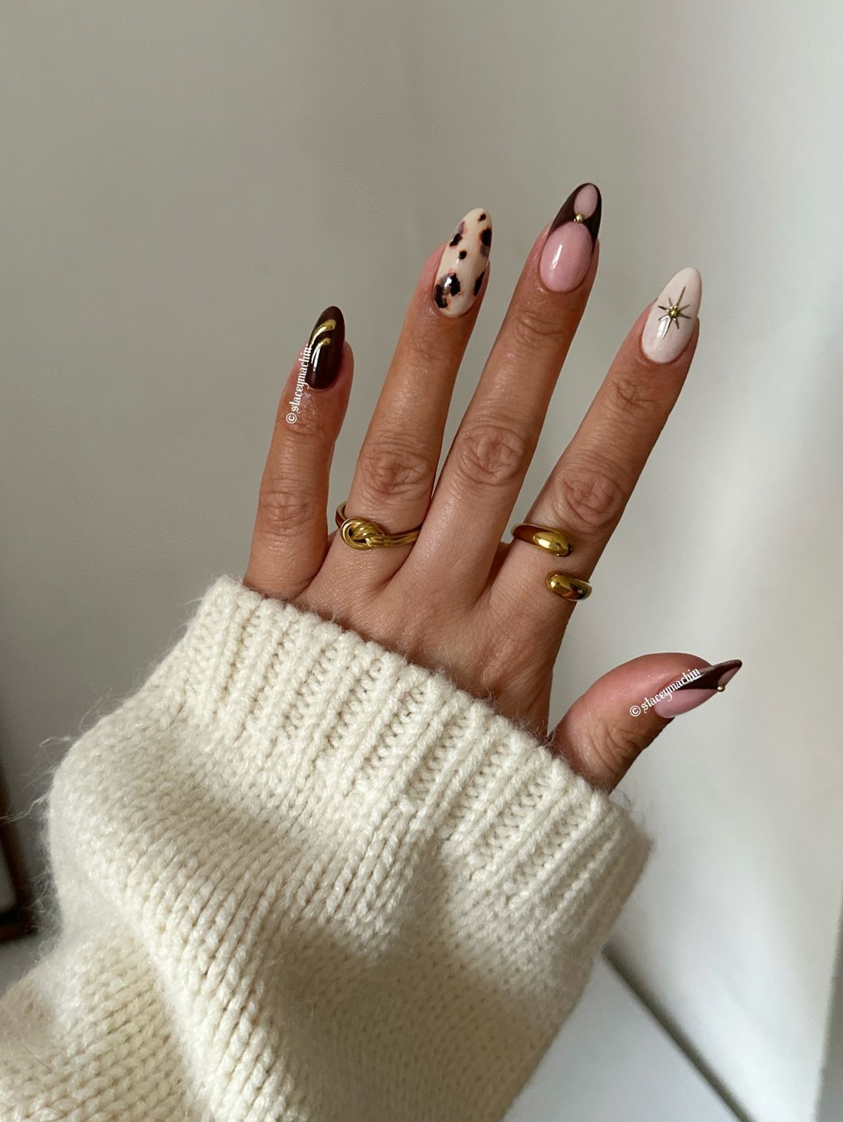 Fall season nails almond with edgy fall nails and short acrylic.