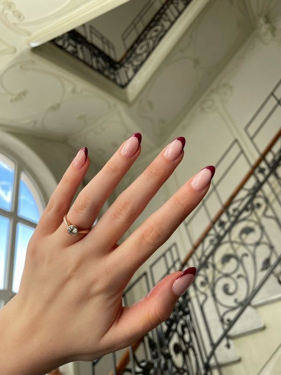 Fall nail ideas almond shape with stiletto nail art fall and french tip.