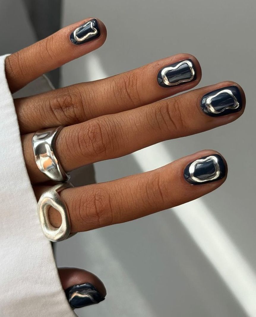 Modern geometric chrome accents on short nails