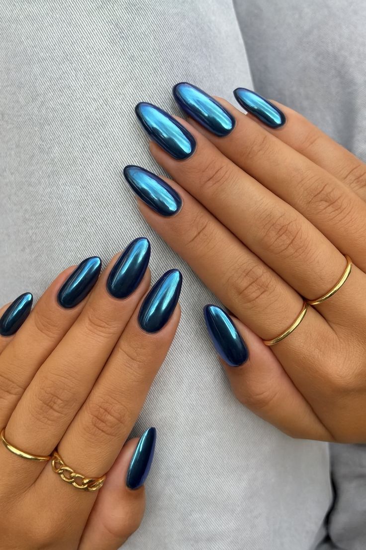 Vibrant blue chrome almond nails