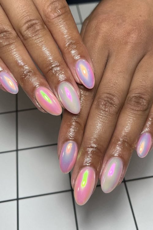 Iridescent pastel nails with chrome finish