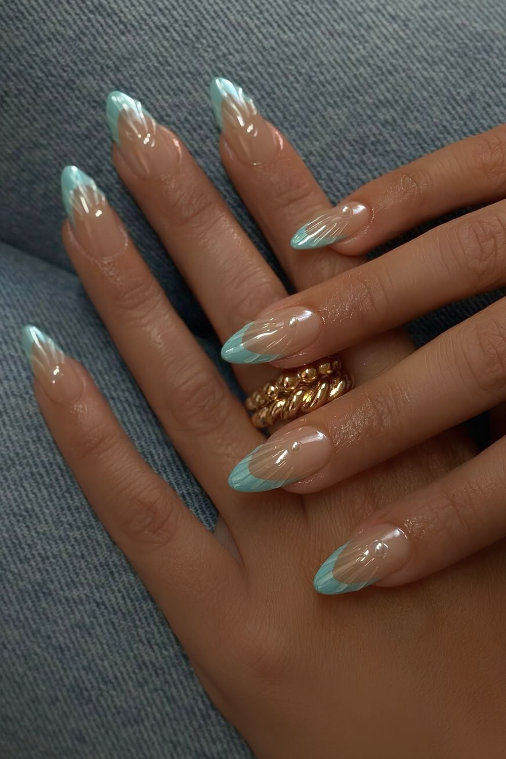 Nude nails with sky blue tips