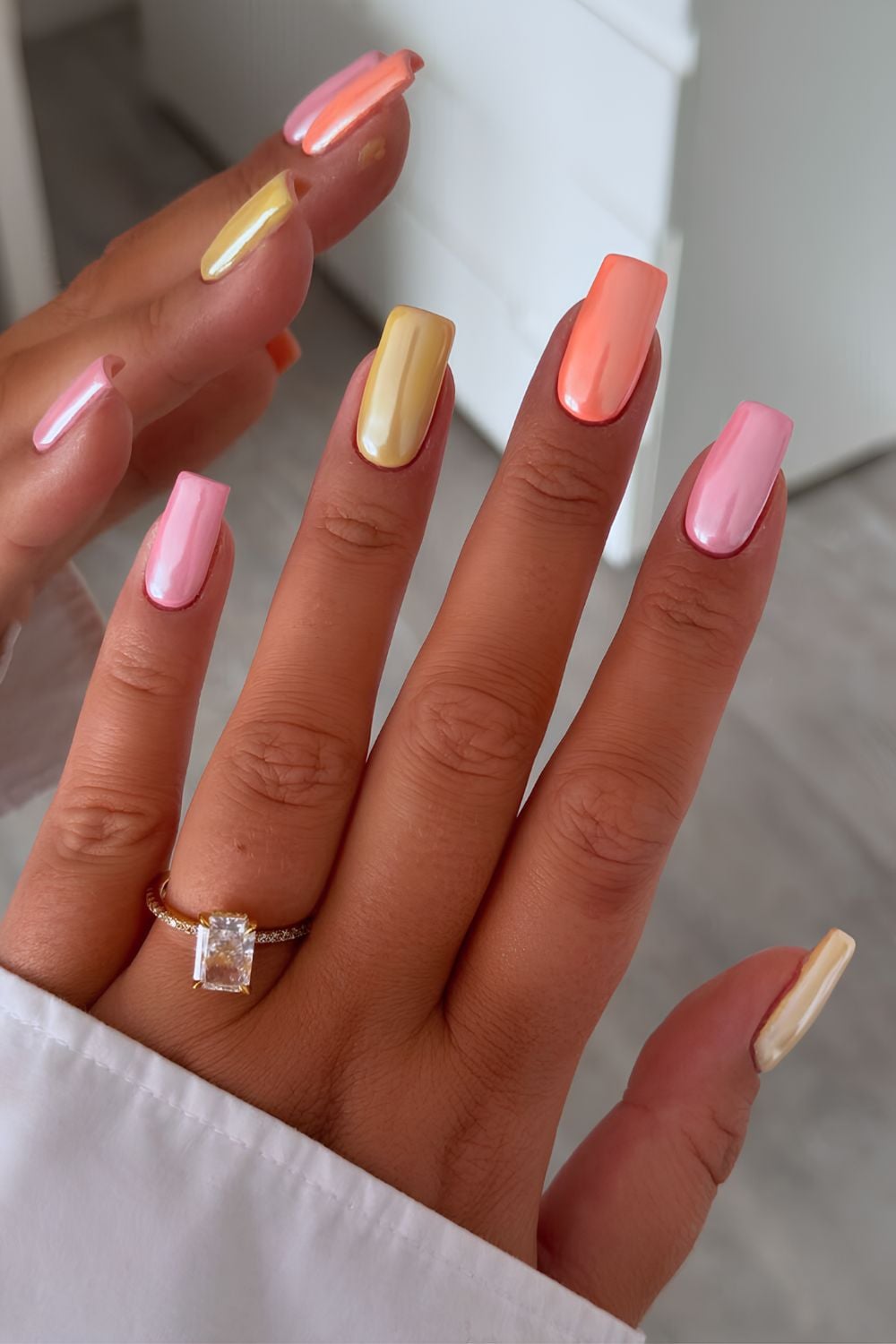 Pastel chrome nails in various shades