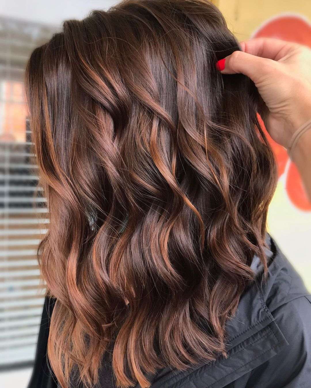dark brown hair with caramel lowlights, balayage
