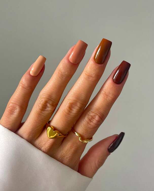 Fall season nails with nail ideas for november in almond shape.