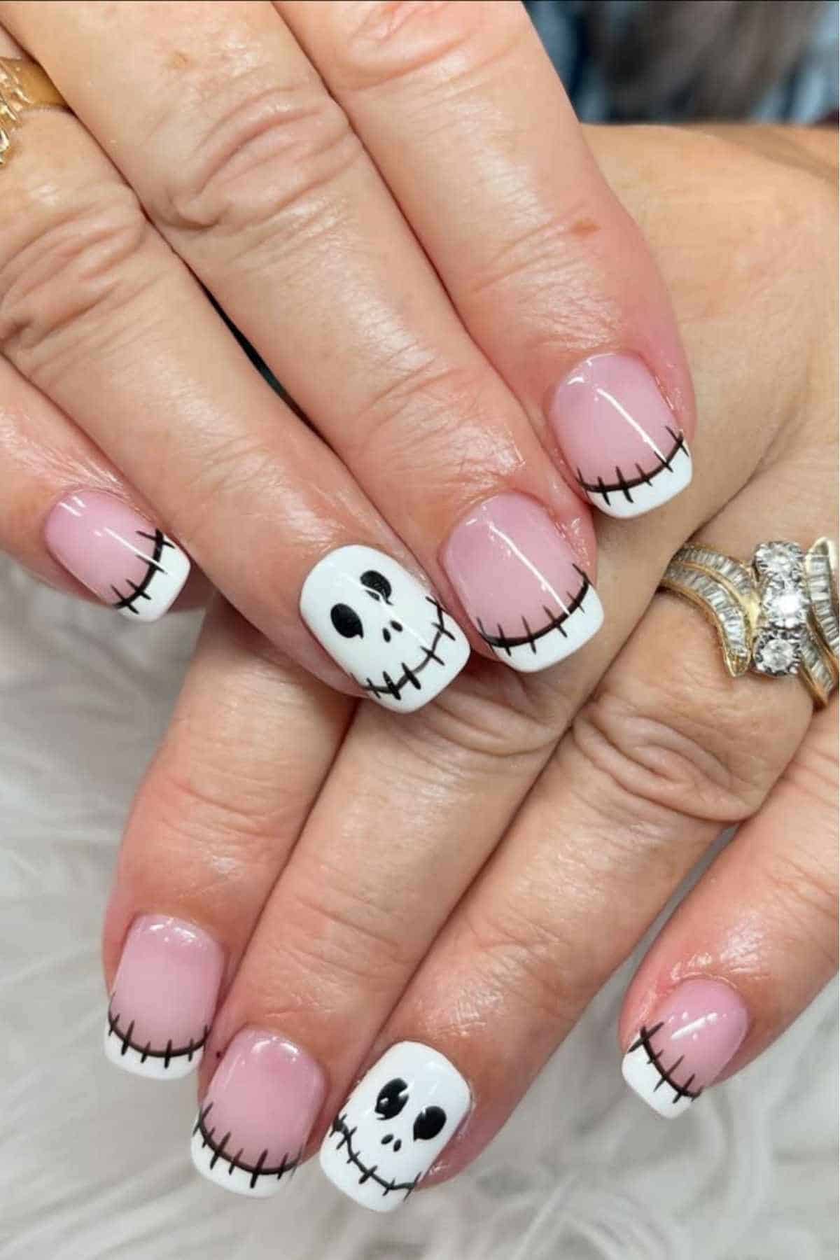 Halloween gel nails short with purple and black nails designs, classy feel