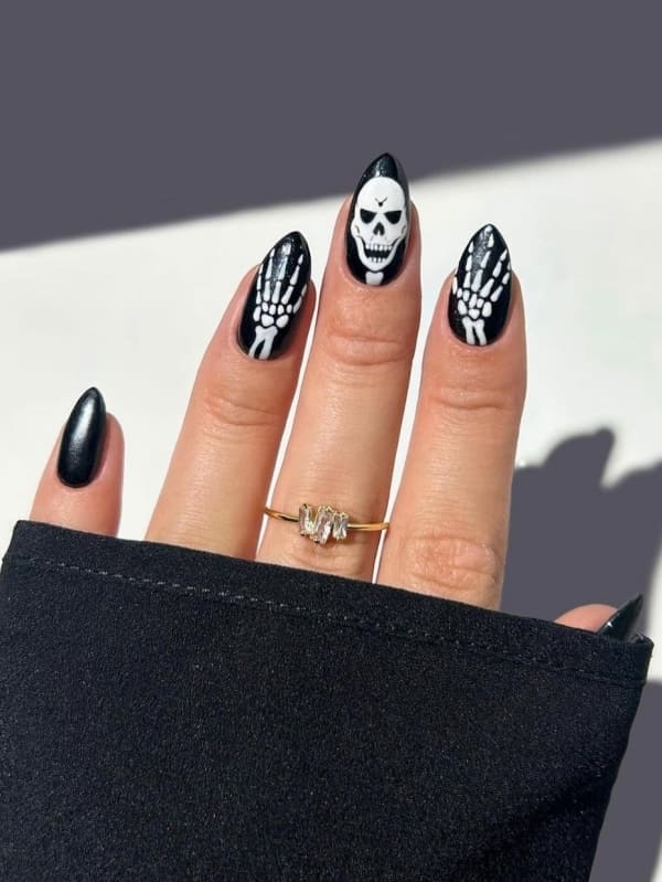 Cute halloween nail ideas with pumpkin face nails