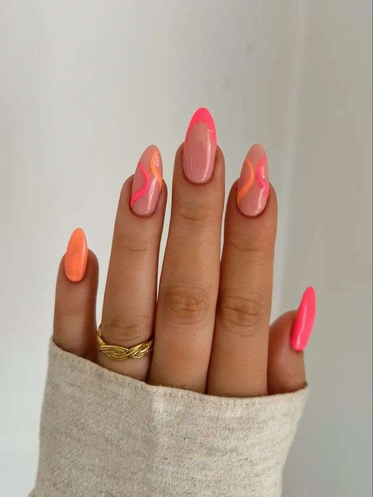 Nail art pink with burgundy and bleu tones. Simple 3D designs in maroon and cherry for autumn flair.